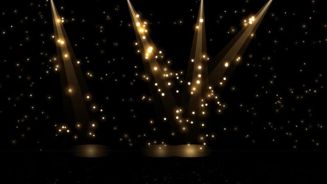 Golden stage spotlights with glowing particles on black background