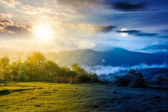day meet night. carpathian mountain landscape with fog. outdoor adventure wallpaper for astrology view of meadow. magic and harmony concept in mountain field and rolling countryside valley. epic sky