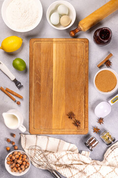 Baking ingredients with cutting board and spices