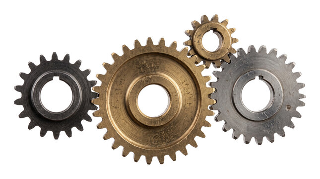 Metallic gears and brass cogs mechanism for industrial engineering or technical mechanical concept work.