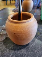 clay pot on a wooden table