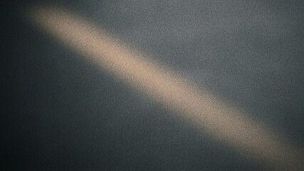 Cinematic light beam on dark textured background, dramatic sun ray hitting grainy charcoal surface, moody spotlight effect for product backdrop © Mix