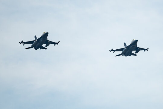 F16 fighter jets isolated against a blue sky