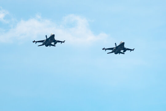 F16 fighter jets isolated against a blue sky