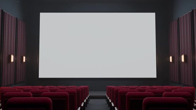 Empty cinema auditorium with blank screen and red seats