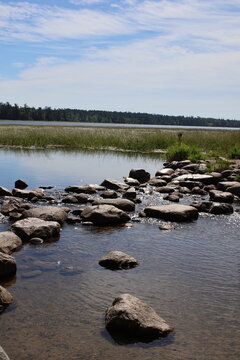 Lake Itasca and Mississippi River Headwaters at Itasca State Park Minnesota, Scenic Lake Itasca in Itasca State Park With Forest and Sunlit Water



