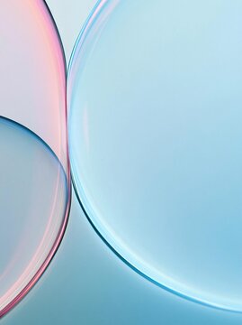 Abstract digital art piece with three overlapping circles. the circles are of different colors - pink, blue, and light blue.