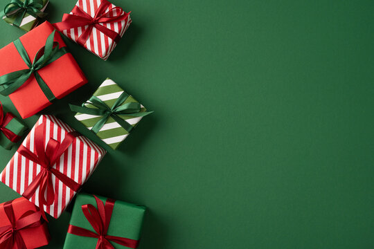Merry Christmas presents wrapped in red and green ribbons for a happy New Year celebration