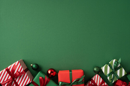 Merry Christmas present and Happy New Year gift with red and green wrapping and ornament