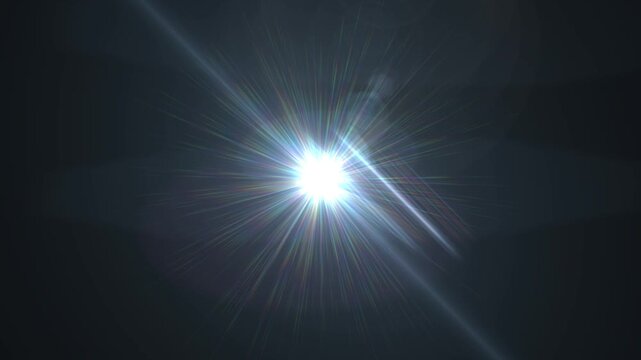 A vivid light burst with radiant rays emanating in a dark background