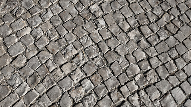 Traditional Portuguese cobblestone pavement texture Lisbon Portugal