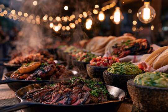 vibrant Mexican street taco buffet with cast-iron skillets