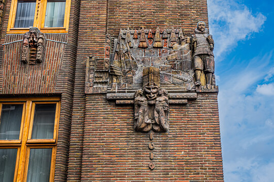 Ornate brick facade of the historic Shipping House (Scheepvaarthuis). It currently houses a Grand Hotel Amrath Amsterdam. Amsterdam, The Netherland. September 12, 2026.
