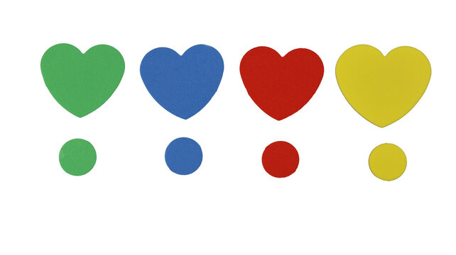 Collection of colored plastic hearts and spheres on a transparent PNG background.