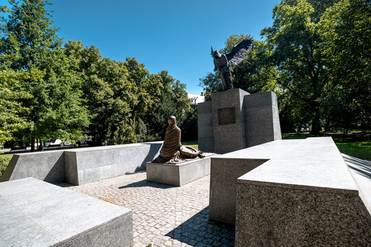 Wroclaw, Poland - July 10, 2026: Monument to the Victims of the Katyn Massacre in Juliusz Slowacki Park features Tadeusz Tchorzewski&rsquo;s Black Angel of Death, Katyn Pieta and granite memorial forms.