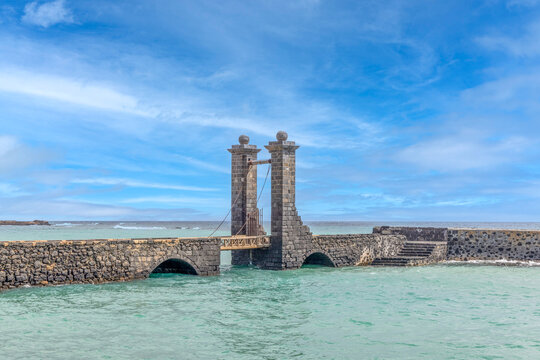 historic Puente de las Bolas - Bridge of the Balls - stone drawbridge leading to the Castillo de San Gabriel in Arrecife, Lanzarote