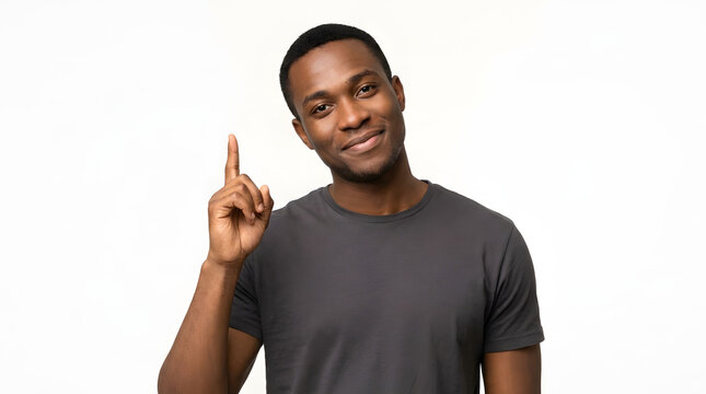 Black man pointing finger up having a creative idea or eureka moment isolated on white