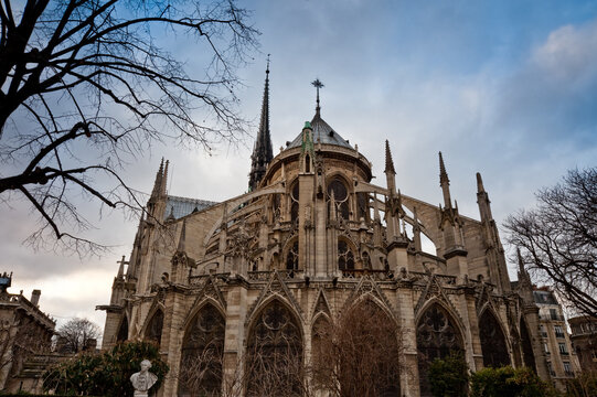 Notre-Dame de Paris Gothic cathedral facade under blue sky
