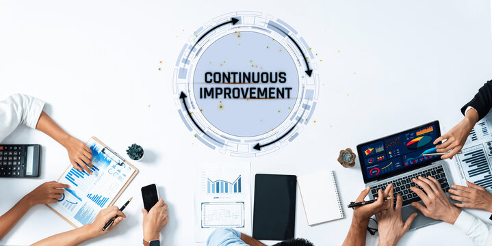 Hands on Business Strategy Meeting with Charts and Graphs for Continuous Improvement and Growth in the Corporate Environment Sigmoid