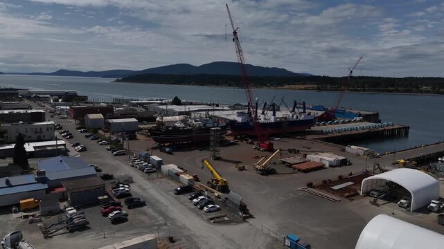 Port Of Anacortes Shipyard And Working Waterfront Overlooking Guemes Channel Aerial Drone 4K Video