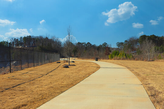 Westside Park In Atlanta during fall with colorful leaves and sidewalks.