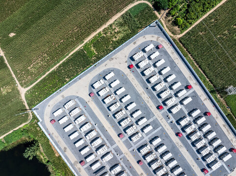aerial view of battery energy storage station in green fields
