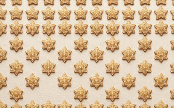Gingerbread star cookies pattern arranged in rows on a light background for Christmas and holiday baking concepts and festive winter food designs