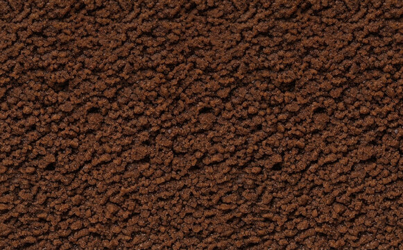 Instant coffee granules texture background close up macro shot of soluble coffee powder texture for food and beverage packaging design