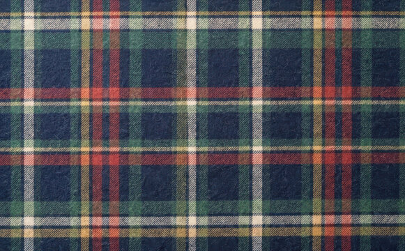 Classic plaid tartan fabric pattern texture background for apparel design, fashion textile, winter flannel clothing, and traditional Scottish heritage themes