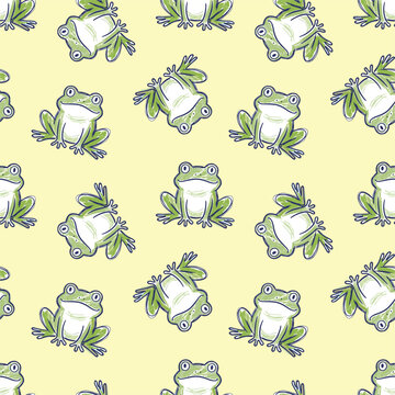 Seamless green frog pattern on yellow. Seamless green frog pattern for textile and paper use