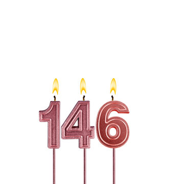 Lit birthday candle - Candle number 146 on white background