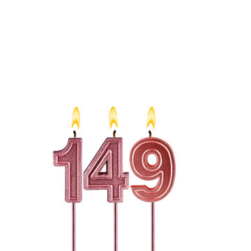 Candle number 149 - Lit birthday candle on white background