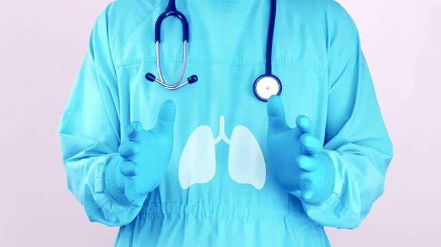 Doctor dressed in light blue displaying a lung icon on his uniform a symbol of lung health, respiratory system care, disease awareness, and preventive medical check-ups.