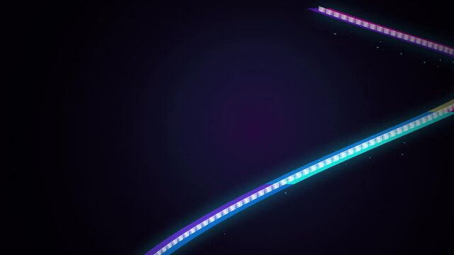 Colorful neon line curves across a dark background in a dynamic video transition