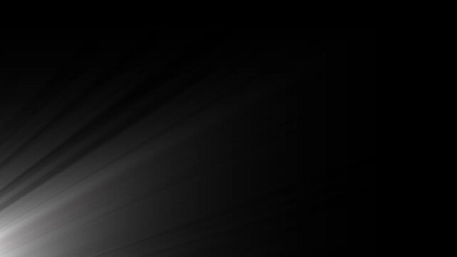 Abstract light rays emanating from the bottom left corner
