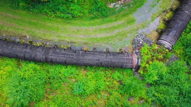 Summer aerial view featuring the 3.4 mile long wooden penstock in Vermont known as The Snake that runs from the Searsburg Dam to a generating station along the Deerfield River with an 8 foot diameter