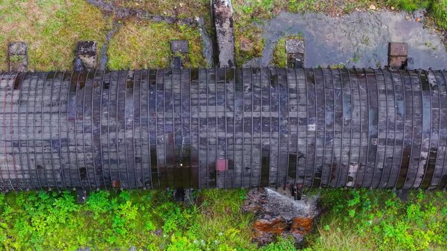 Summer aerial view featuring the 3.4 mile long wooden penstock in Vermont known as The Snake that runs from the Searsburg Dam to a generating station along the Deerfield River with an 8 foot diameter