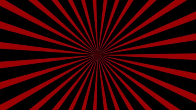 Red sunburst rays rotate continuously in a seamless loop, spreading bright beams across a black background for a classic retro visual effect in video.