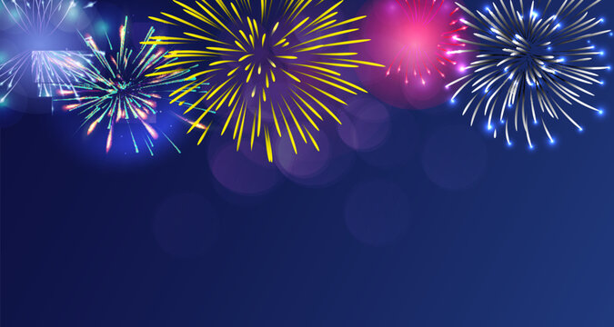 A bright, colorful fireworks display against a twilight background.