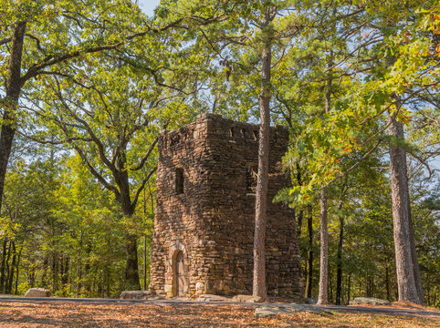 Stone tower in forest