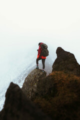 Fototapeta premium Hiker at Helvellyn summit in the English Lake District, England