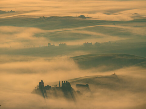 Sunrise view of the fog at Val d'Orcia, Tuscany.