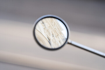 Mirror reflects. Building appears. Columns dominate. Architecture blurs. © VladyslavShcherbakov