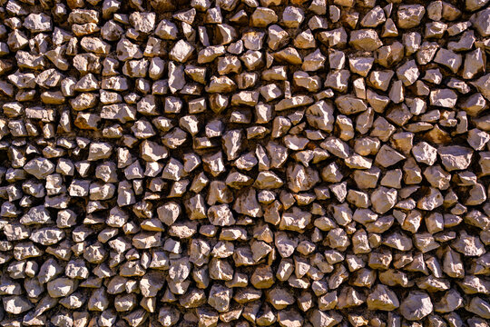 Stone wall background. Stone blocks creating scenic background. Rock wall pattern for design. Textured stonework background. Natural stone material background.