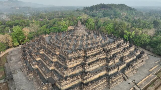 Aerial view of Borobudur Temple in Yogyakarta, Java, Indonesia at sunrise.