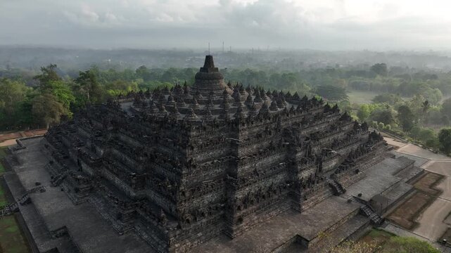 Aerial view of Borobudur Temple in Yogyakarta, Java, Indonesia at sunrise.