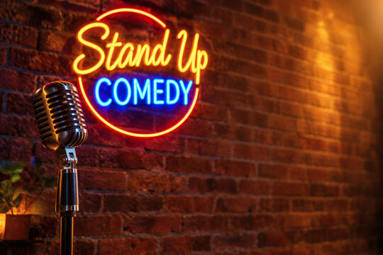 vintage microphone and neon stand up comedy sign on brick wall retro open mic night stage photorealistic golden hour wide angle photo with bokeh