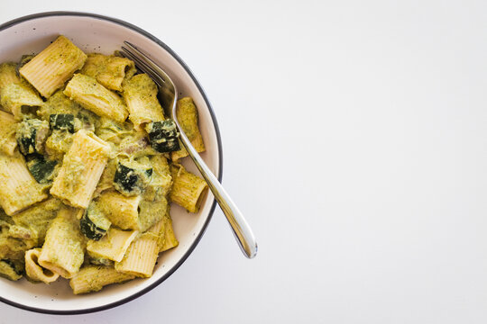 creamy zucchini rigatoni pasta with vegetables for a healthy vegetarian meal