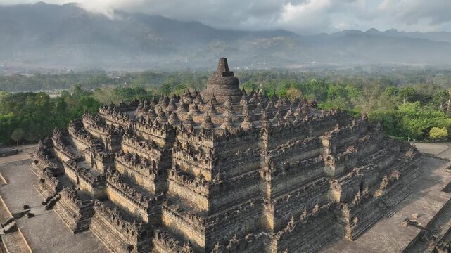 Aerial view of Borobudur Temple in Yogyakarta, Java, Indonesia at sunrise.