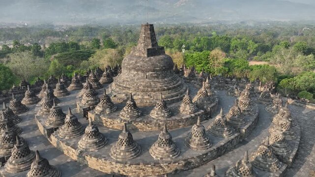 Aerial view of Borobudur Temple in Yogyakarta, Java, Indonesia at sunrise.